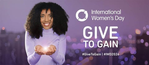 purple background, woman with long dark hair smiling