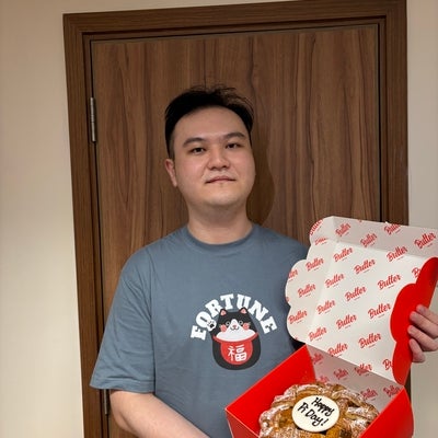 man standing with a pie