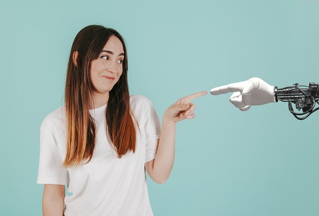 Female interacting with robot 