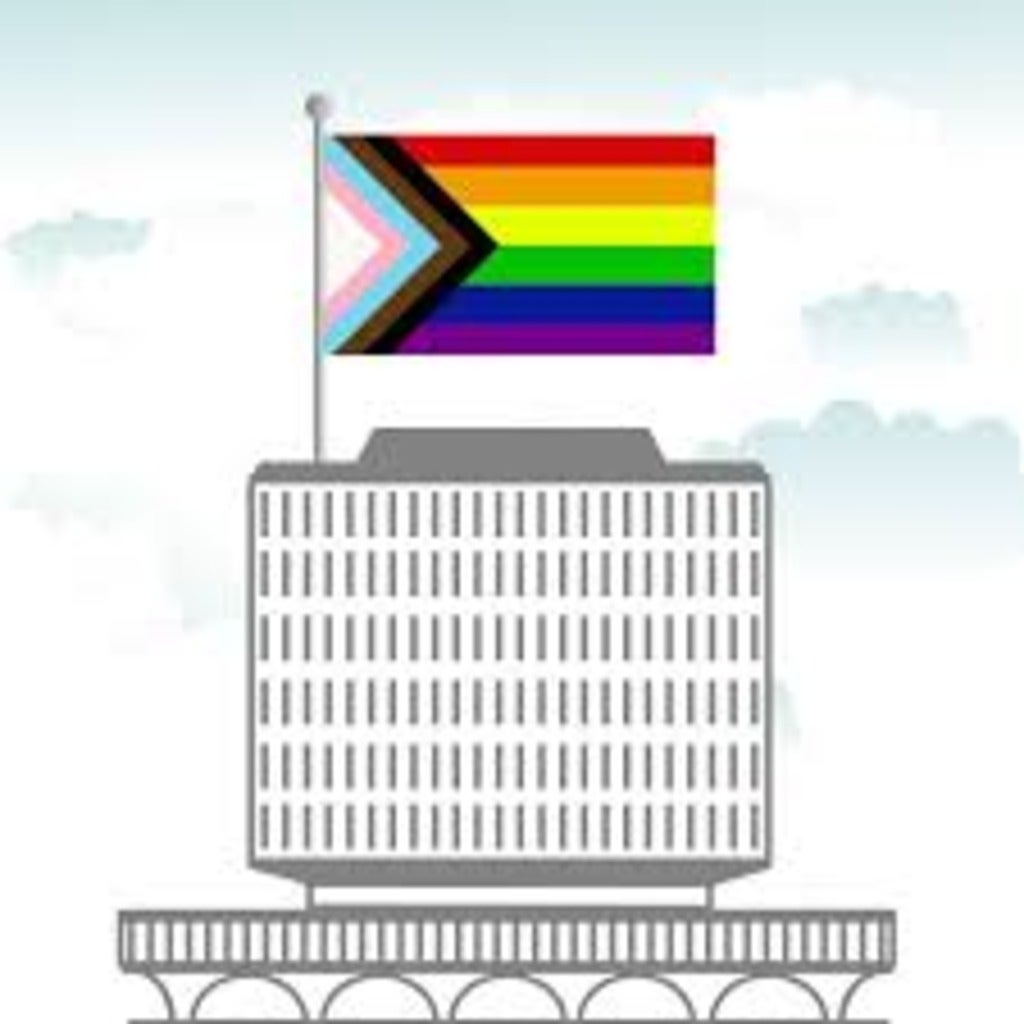 An image of Dana Porter Library with the Pride flag on top