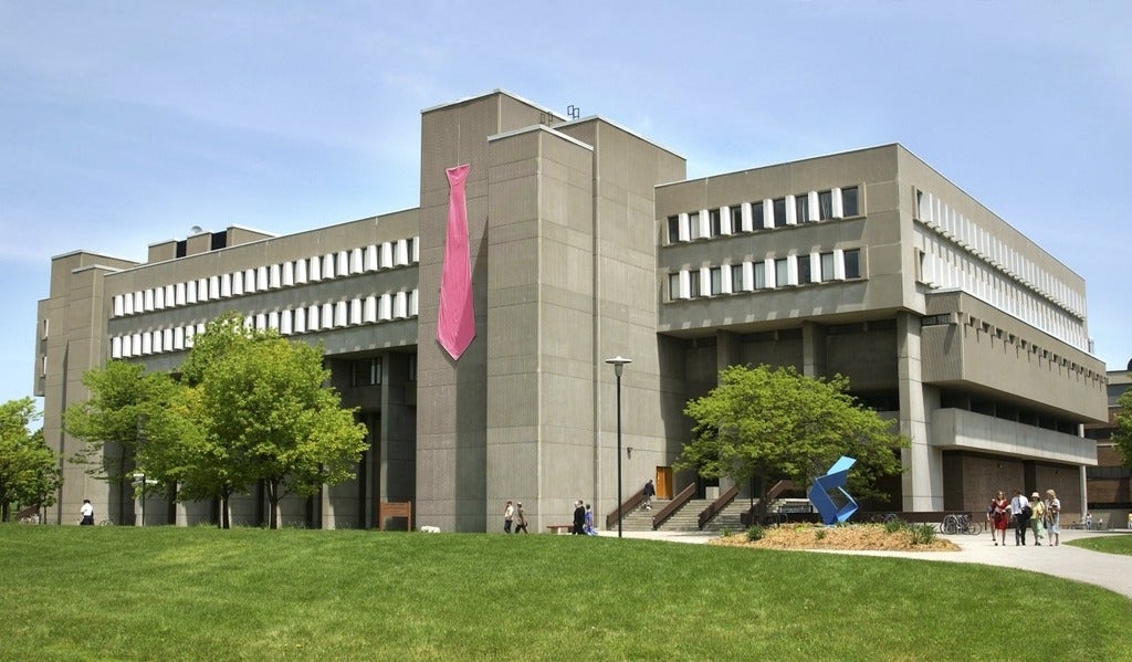 MC building with large pink tie