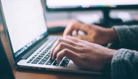 Person working on their laptop 