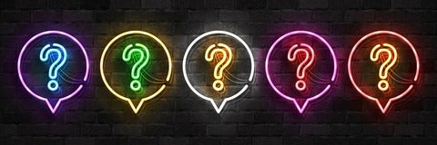 An image of five neon question marks