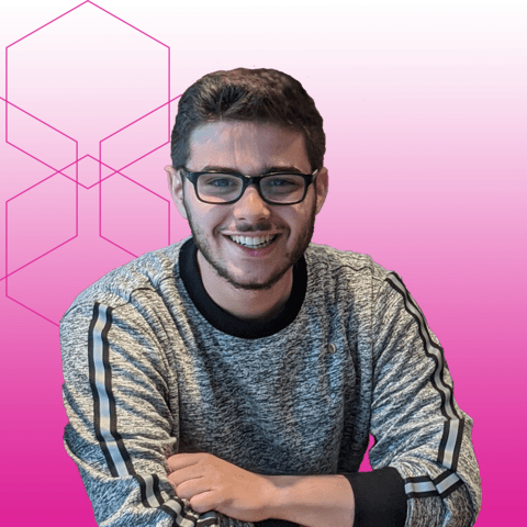 Ryan Goldford portrait with pink background