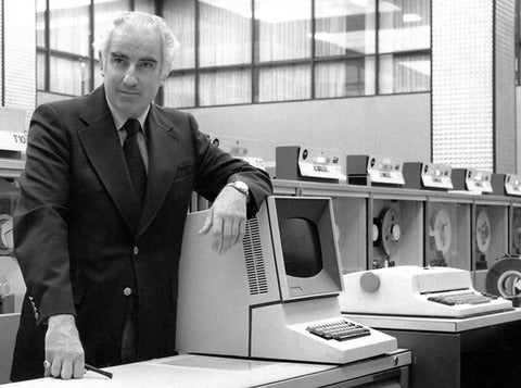 Wes Graham at the University of Waterloo beside an IBM 360/75