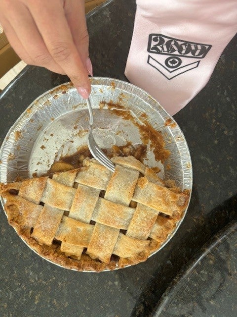 3/4 of a pie with a pink tie