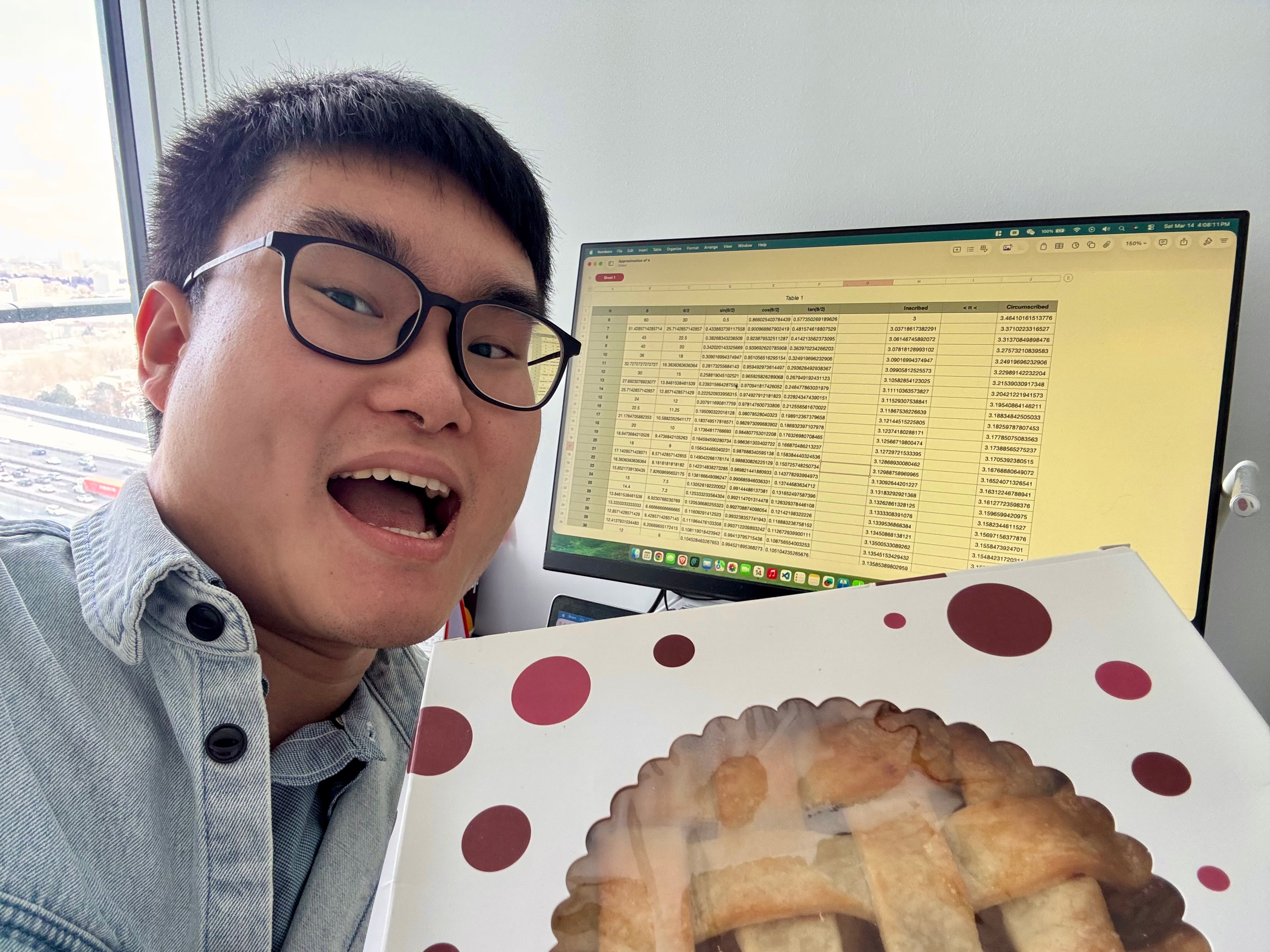 Man holding on to pie in the box