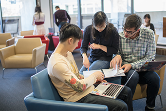 Students talking in MC lounge