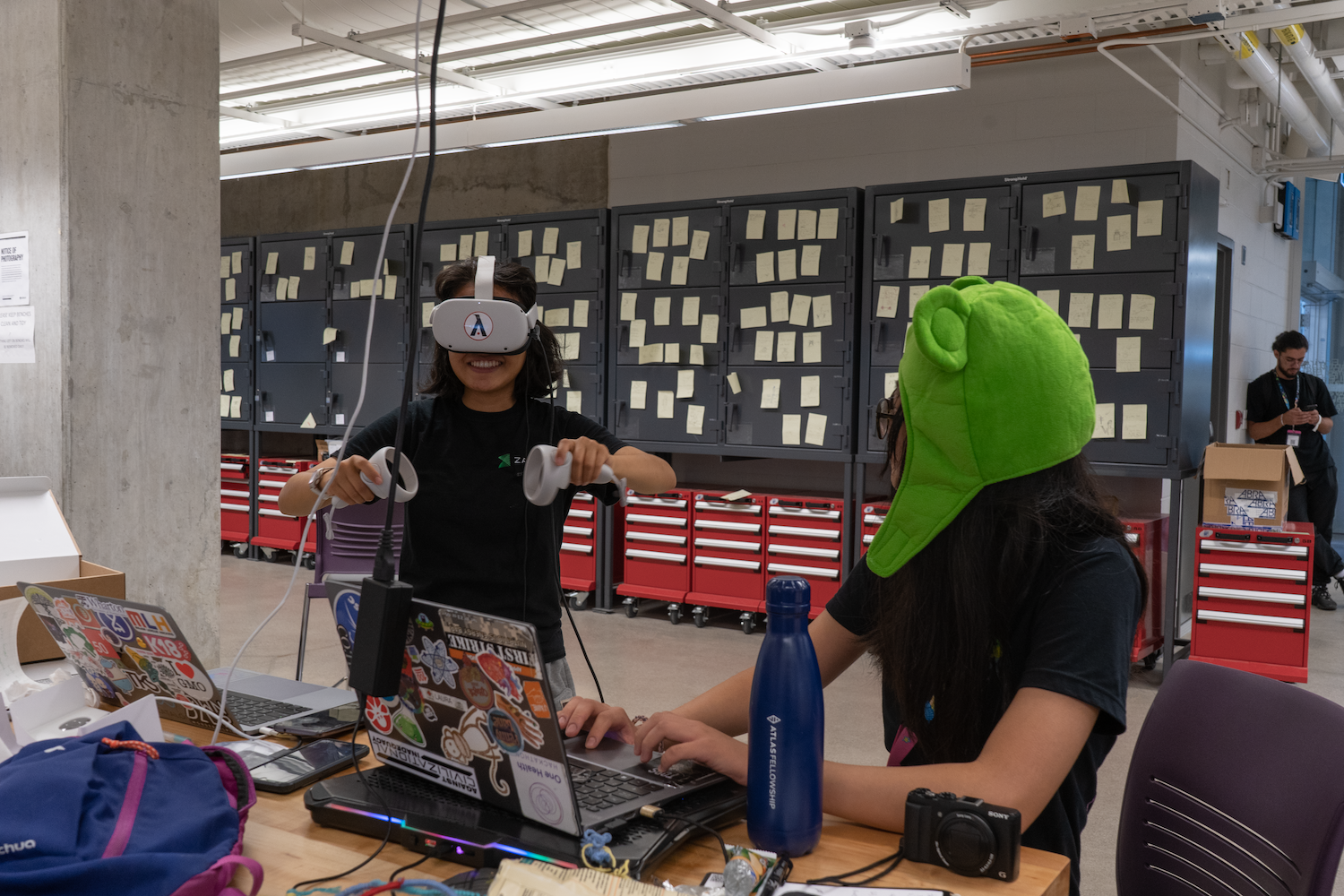 Two students experiment with VR technology