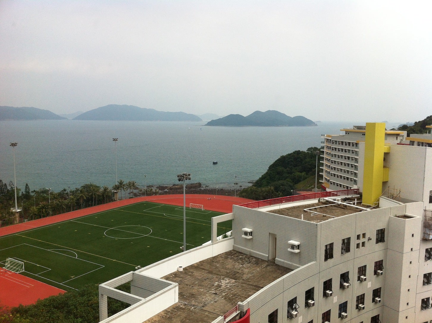 looking out my residence window at HKUST track field on the shore