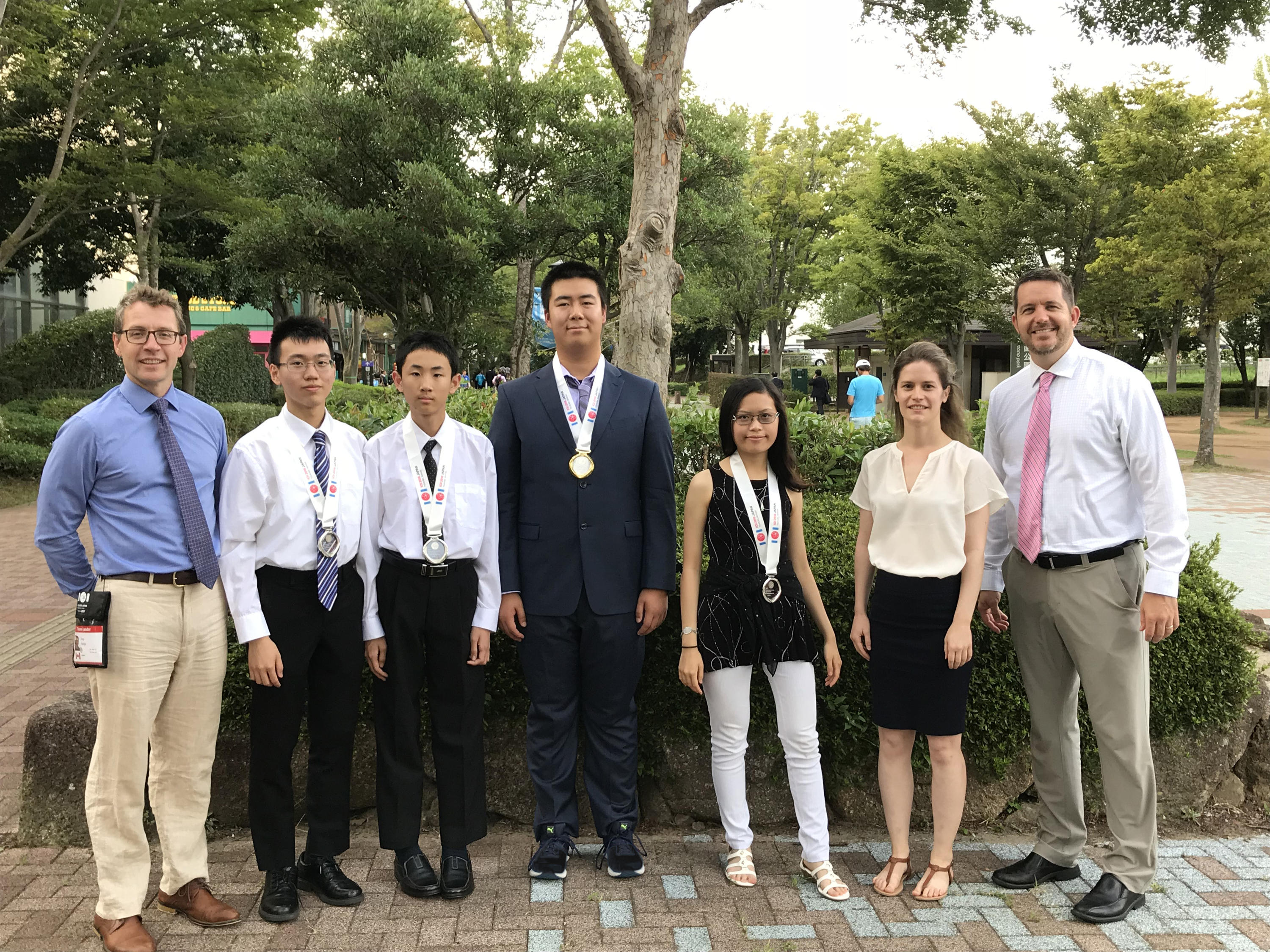 Troy Vasiga, Victor Rong, Zixiang Zhou, Joey Yu, Ava Pun, Carrie Knoll, J.P. Pretti at the 2018 International Olympiad in Inform