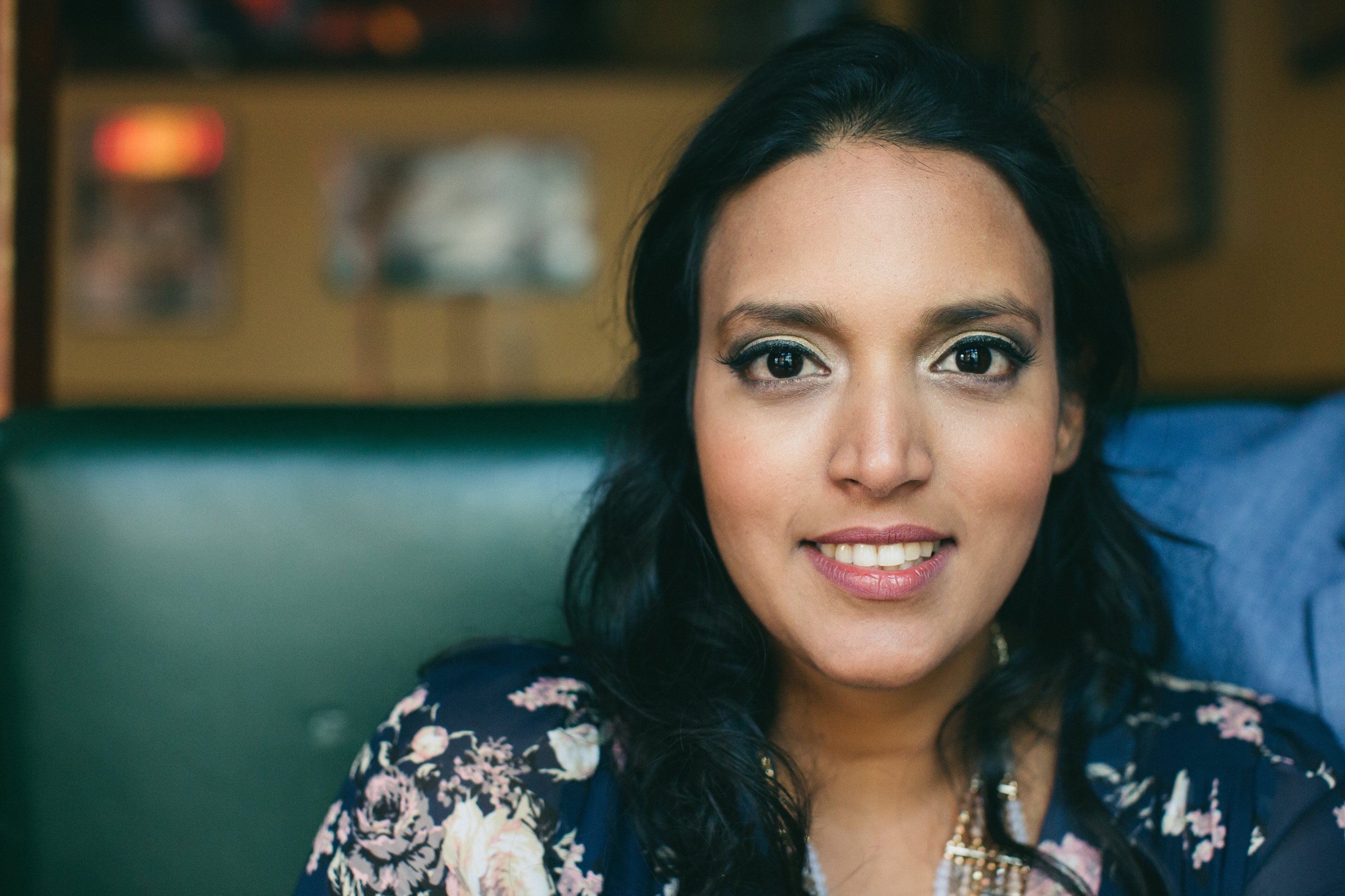 woman smiling and posing for a picture