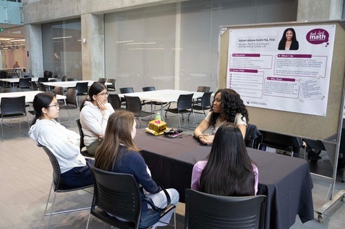 Students learn about math careers from an industry professional