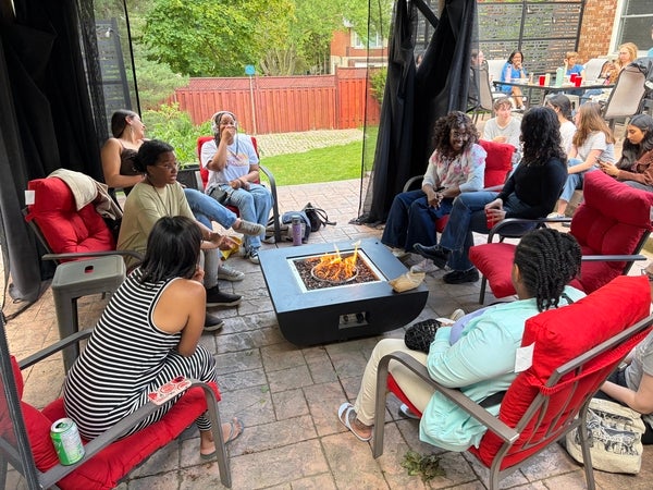 Participants have a bonfire