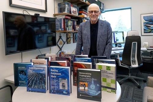M. Tamer Özsu with his books