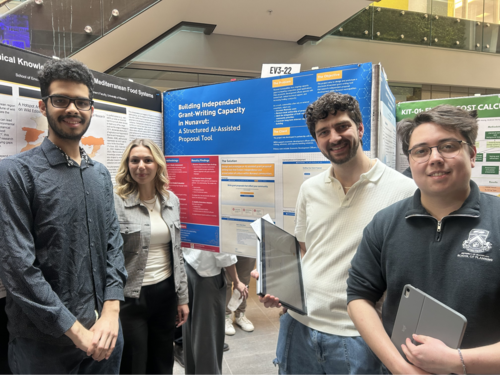 Brandon and his group with their research poster