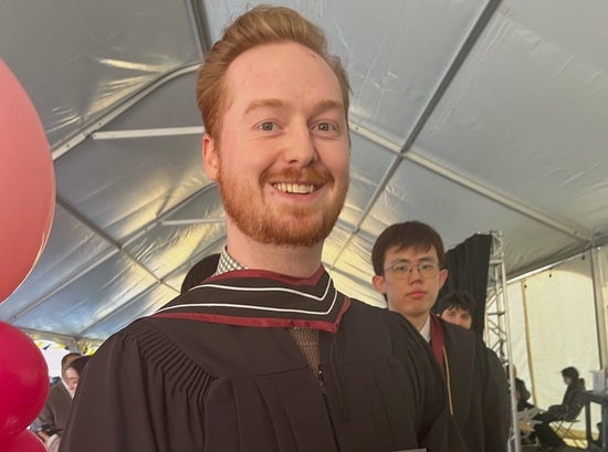 Aiden Huffman at his master's graduation