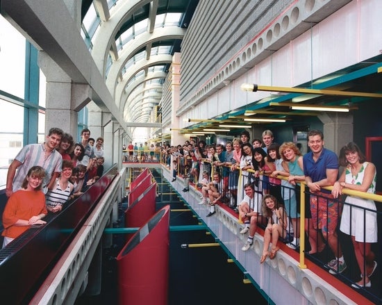 A crowd of 1980s students posing in the Davis Centre
