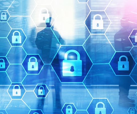 abstract image of computers and lock icons indicating cybersecurity