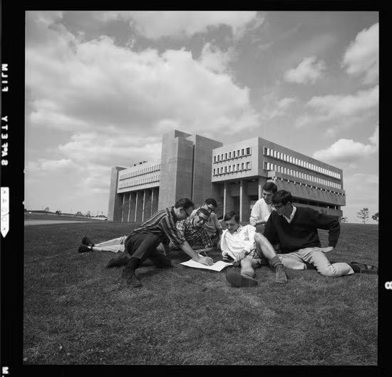 Students study together in front of the newly completed MC, 1968