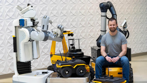 Ryan Gariepy with robots