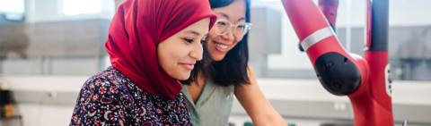 A prof and a student working together in a lab