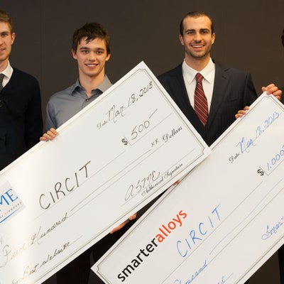  Best Overall group holding wining cheques