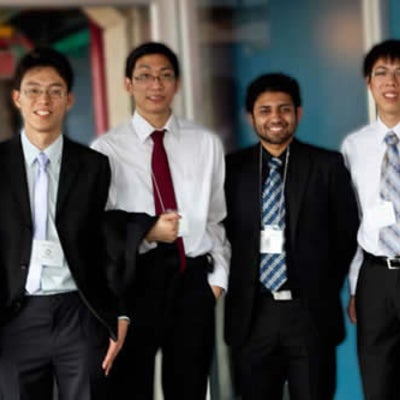 six people smiling for the camera