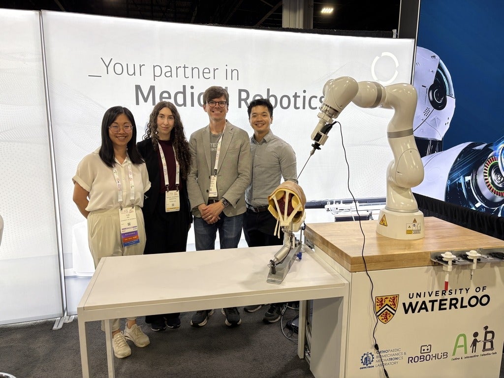 TEAM SERA poses together at international robotics conference.