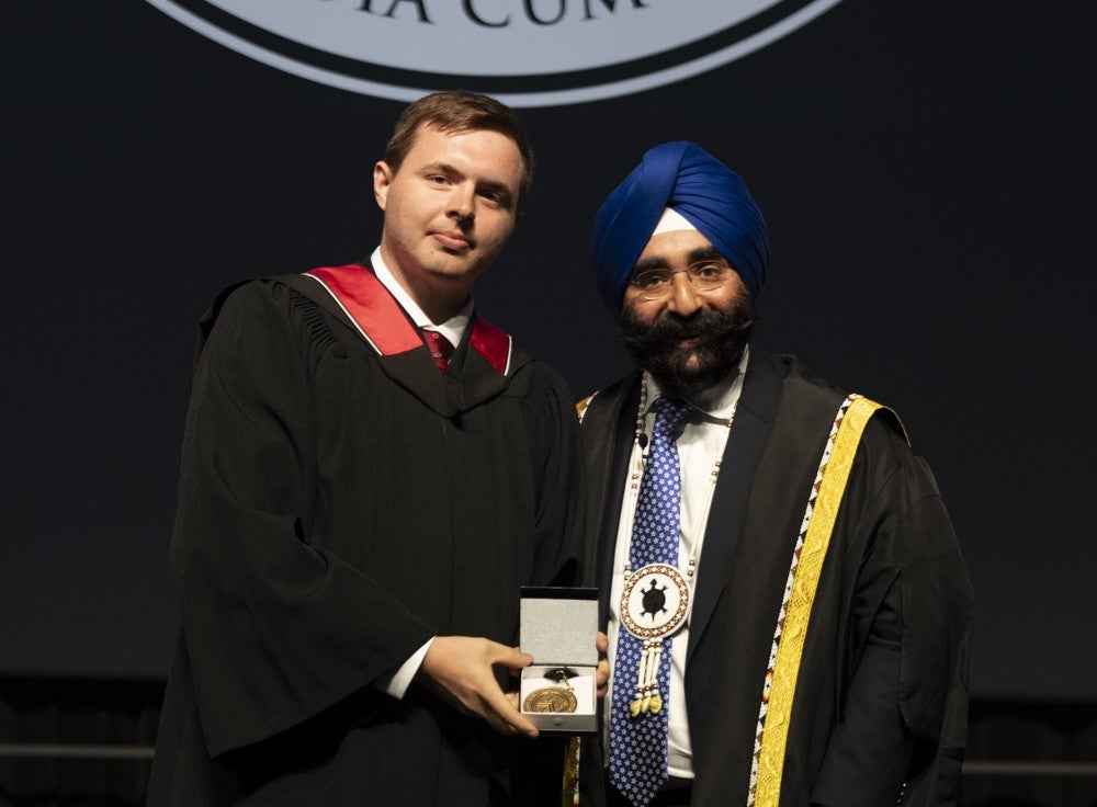 Matthew with Jagdeep Singh Bachher at convocation