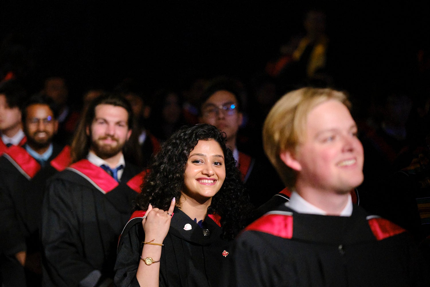 Soon-to-be alumna showing off her iron ring walking into the ceremony. 