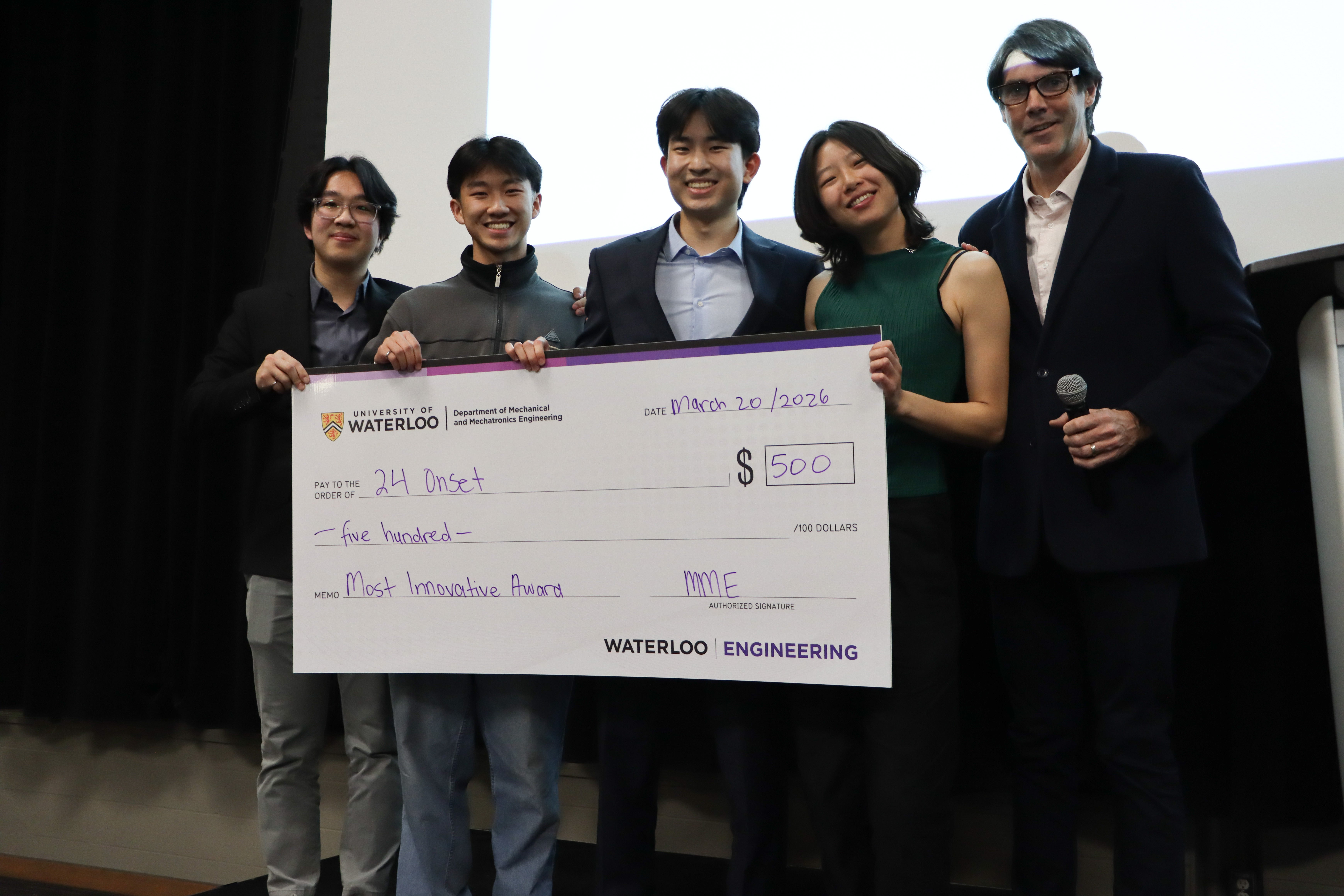 Onset winning the Most Innovative Award at their Capstone Design dinner