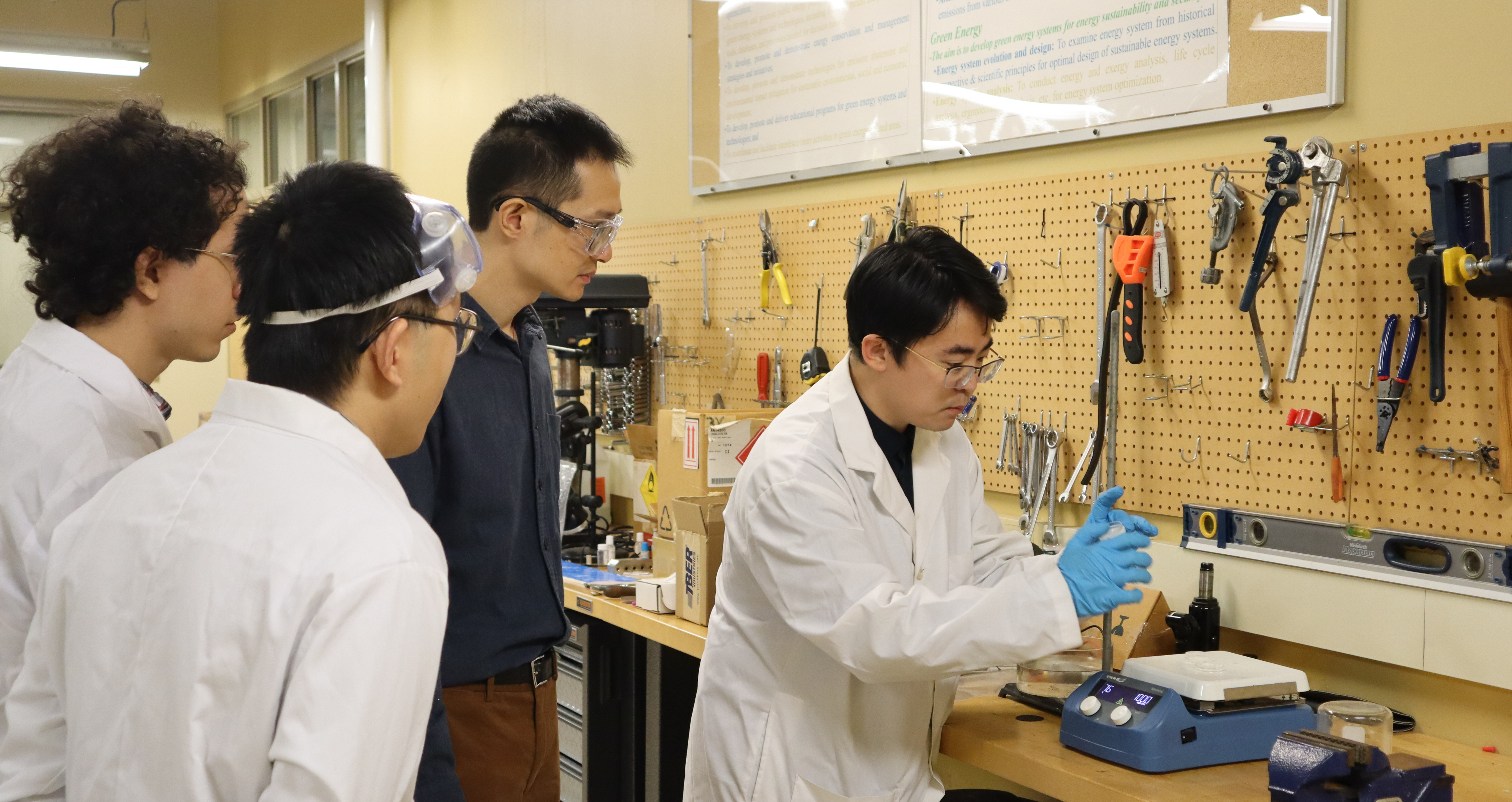 Students and professor conducting thermal engineering research