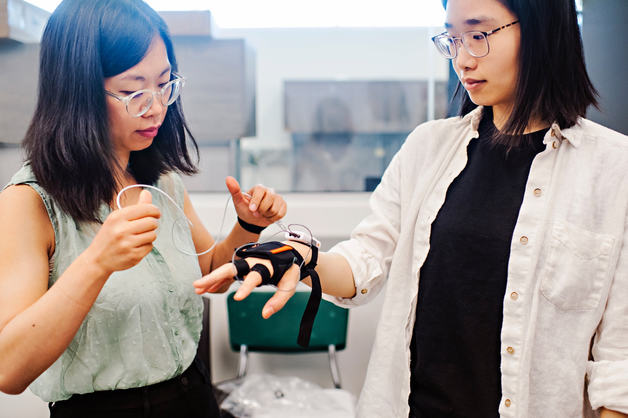 Professor and student using wearable sensors