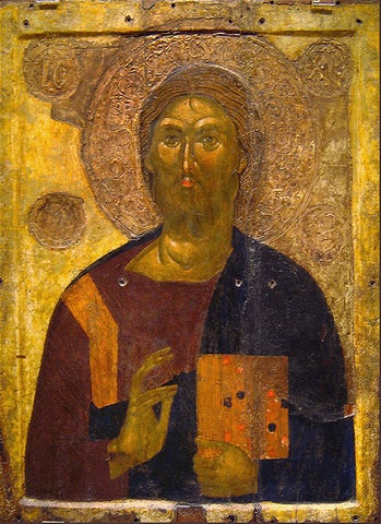 A Medieval religon image of a saint  in a dark robe surrounded by a halo and gold background