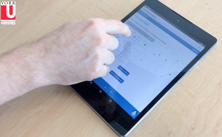 Person using the STEM teaching app on a tablet.