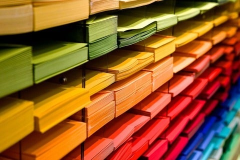 Multi Coloured Folders Piled Up 