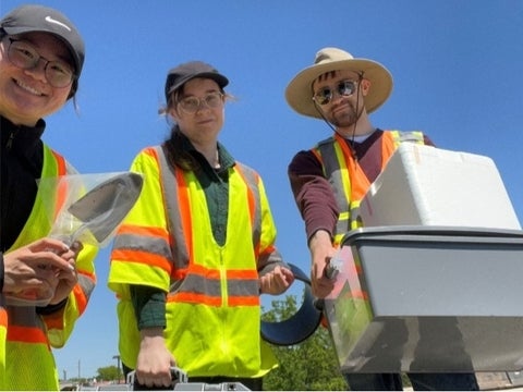 The research team heading out to a Waterloo Region landfill to collect cover soil samples and measure methane flux.
