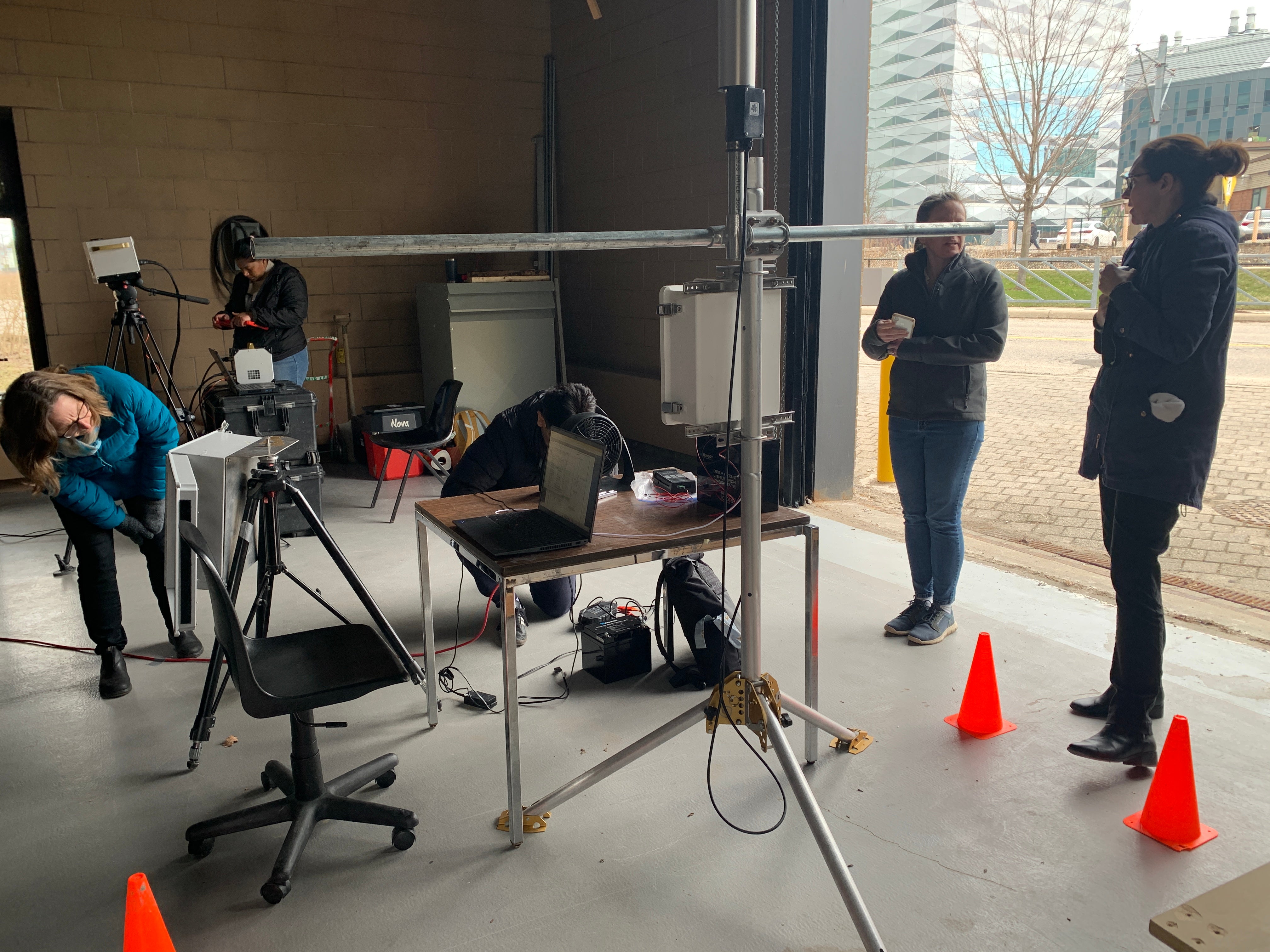 Participants step around a 3D ultrasonic anemometer.