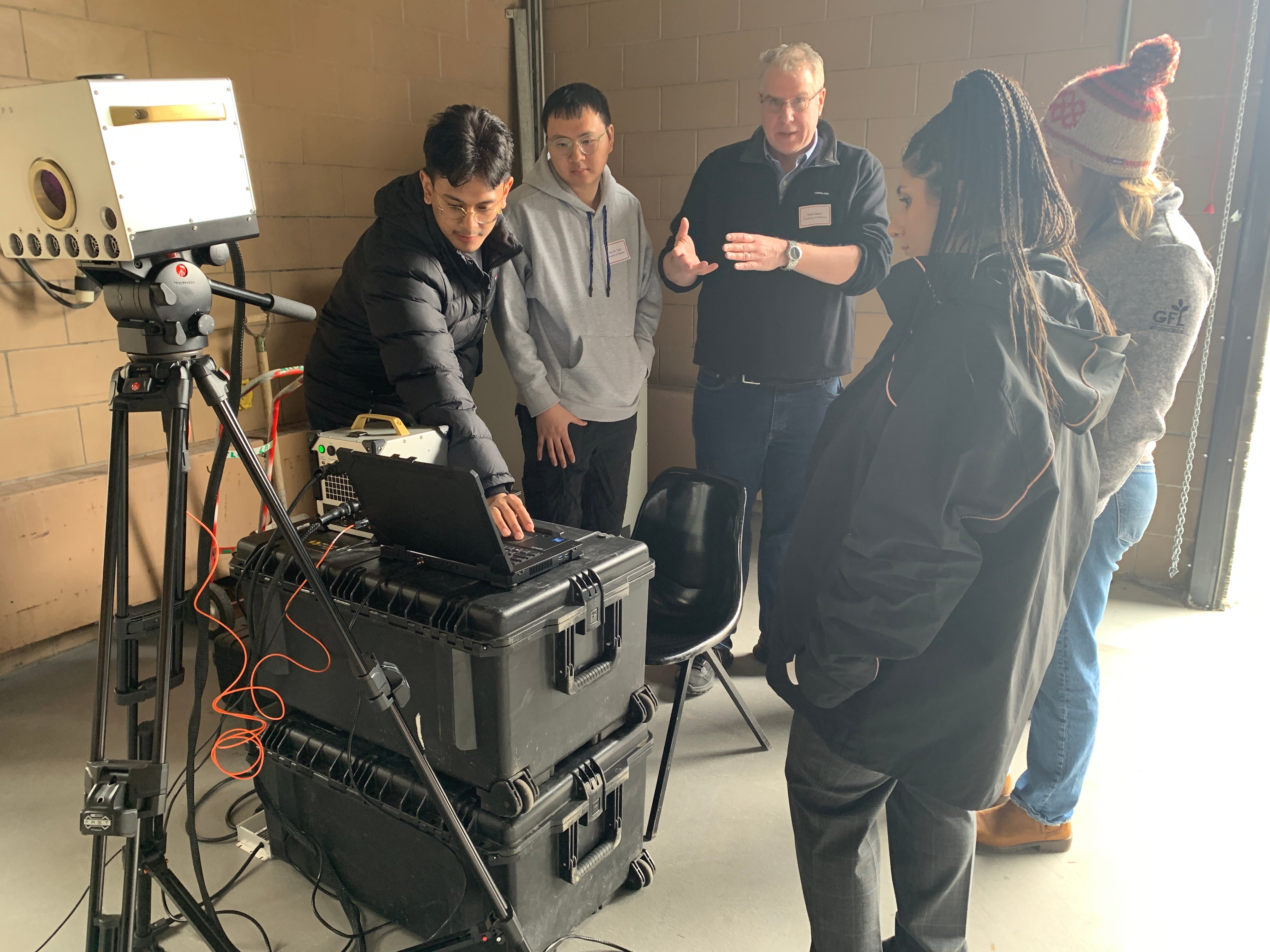 Prof. Kyle Daun talks to participants about the hyperspectral camera.