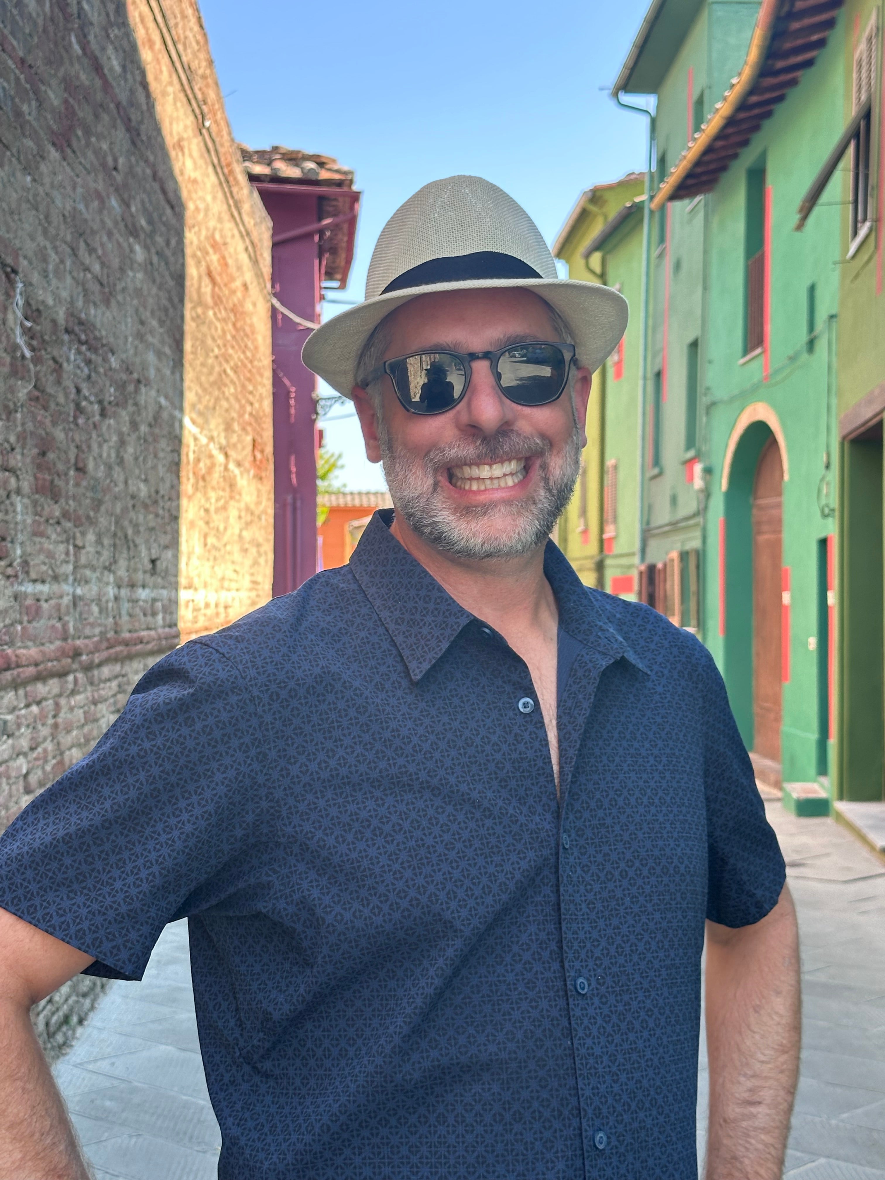 David Moscovitch Casual Image with a Hat Sunglasses and Smile