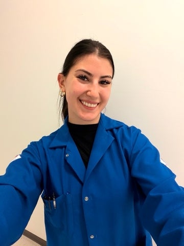 Amanda in a lab coat