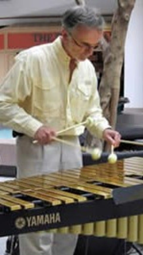 Michael Wood playing a marimba