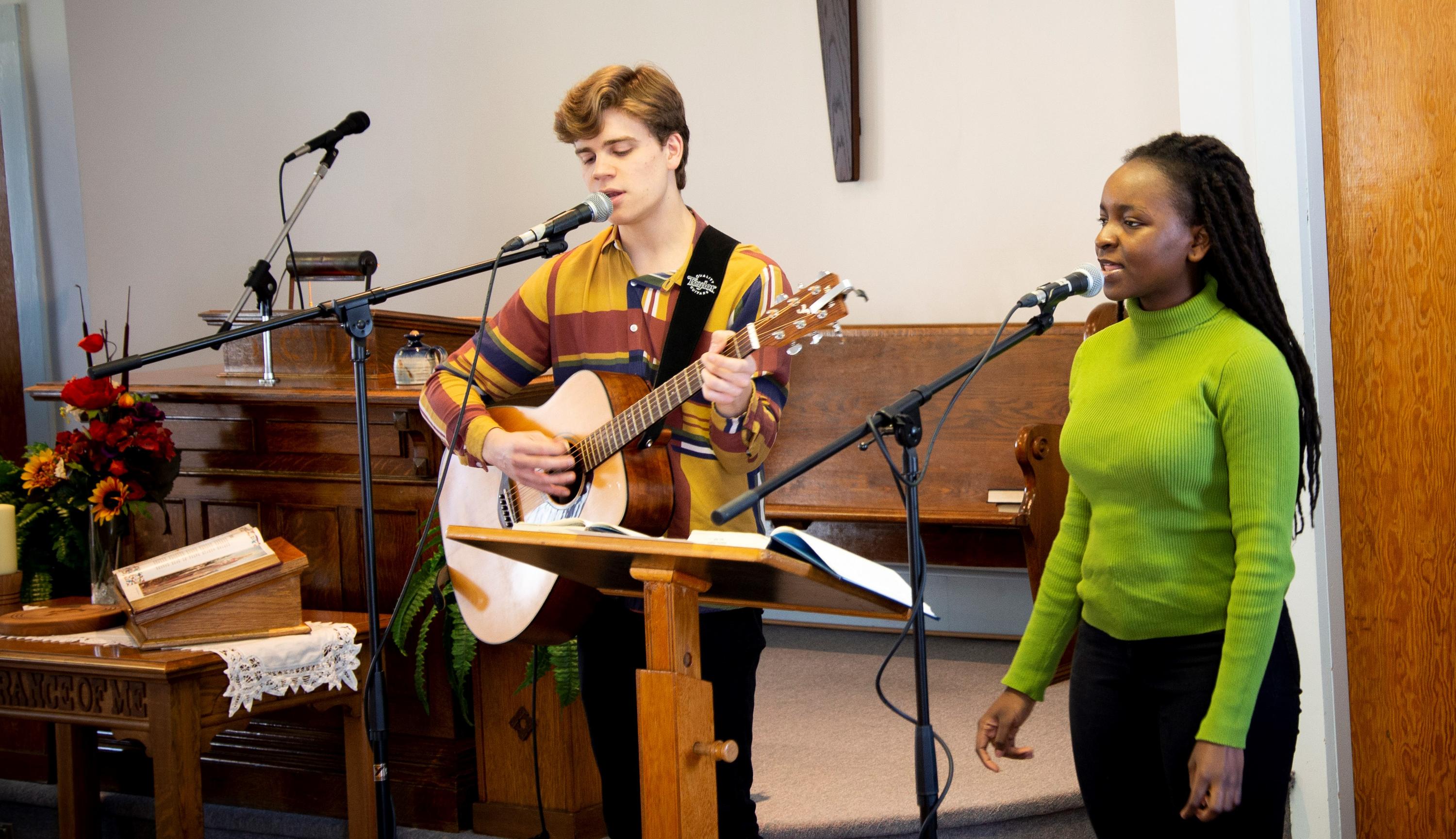Students leading a worship service