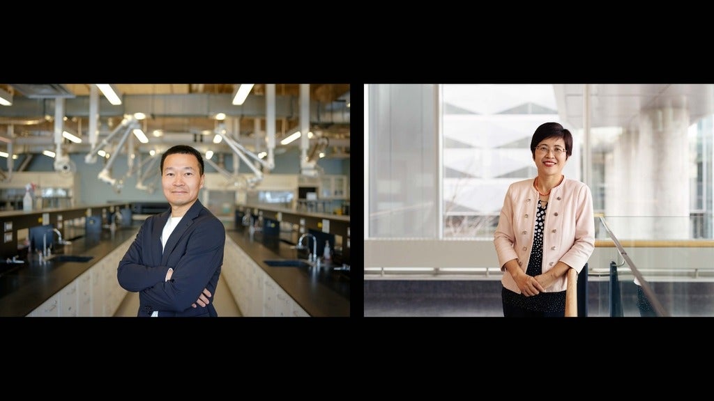 an man with crossed arms and a woman in a pink jacket and glasses