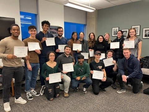 Nanotechnology Engineering students holding their certificates from making the Dean's Honour List
