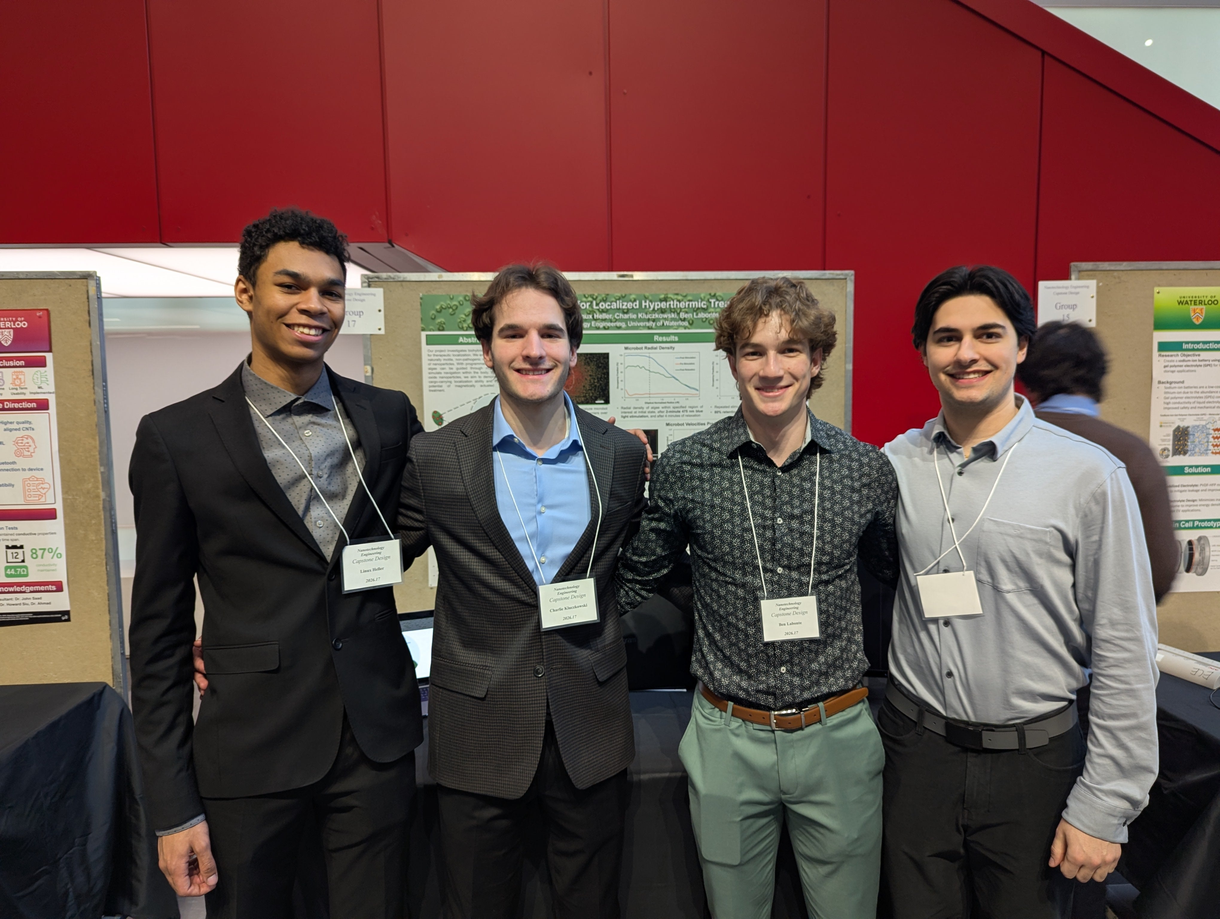 Four men smiling 