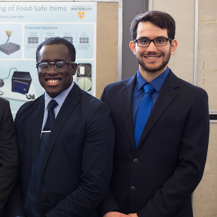 Students with project poster at the 2016 Capstone Design Symposium