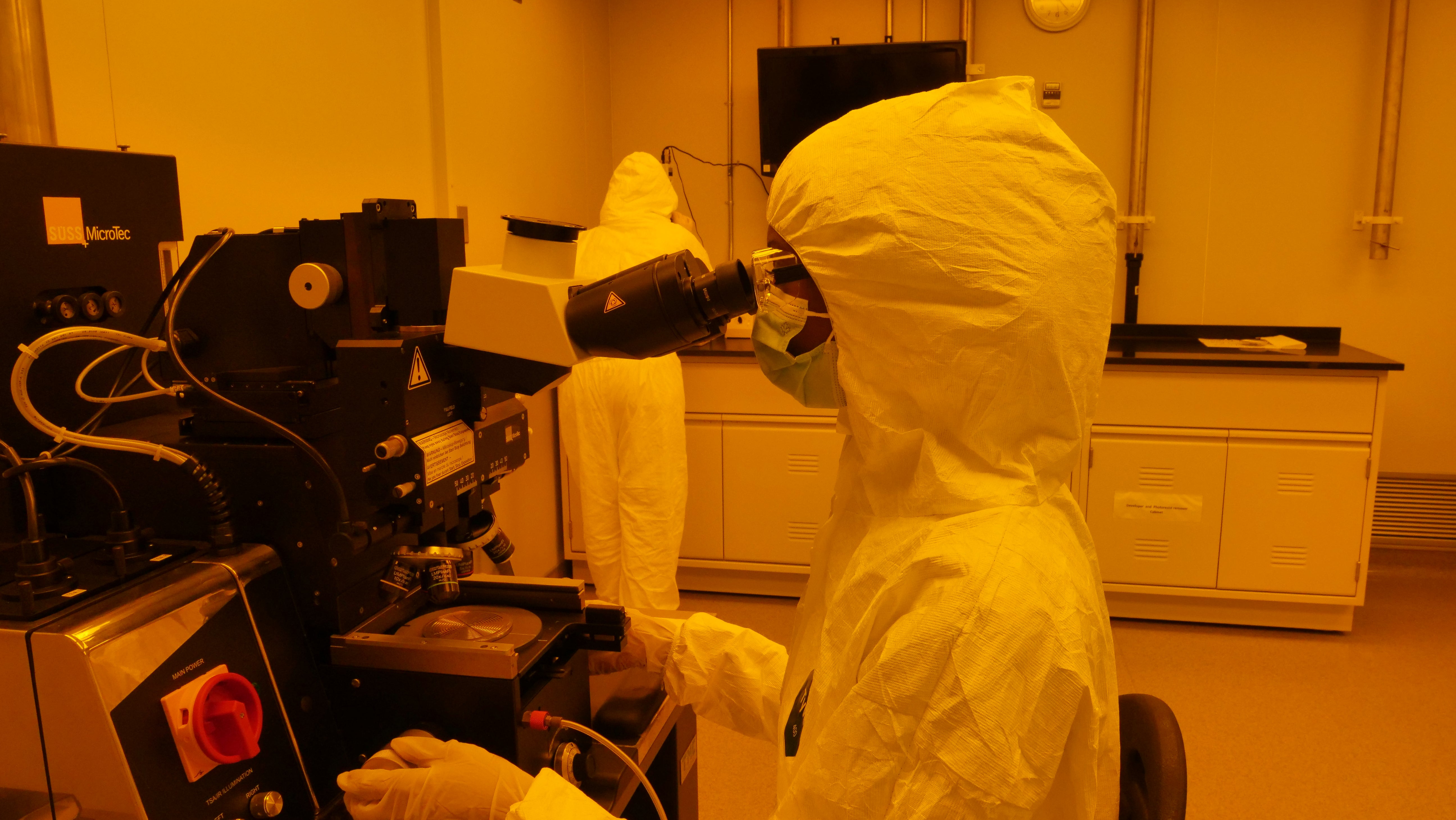 person working in a cleanroom