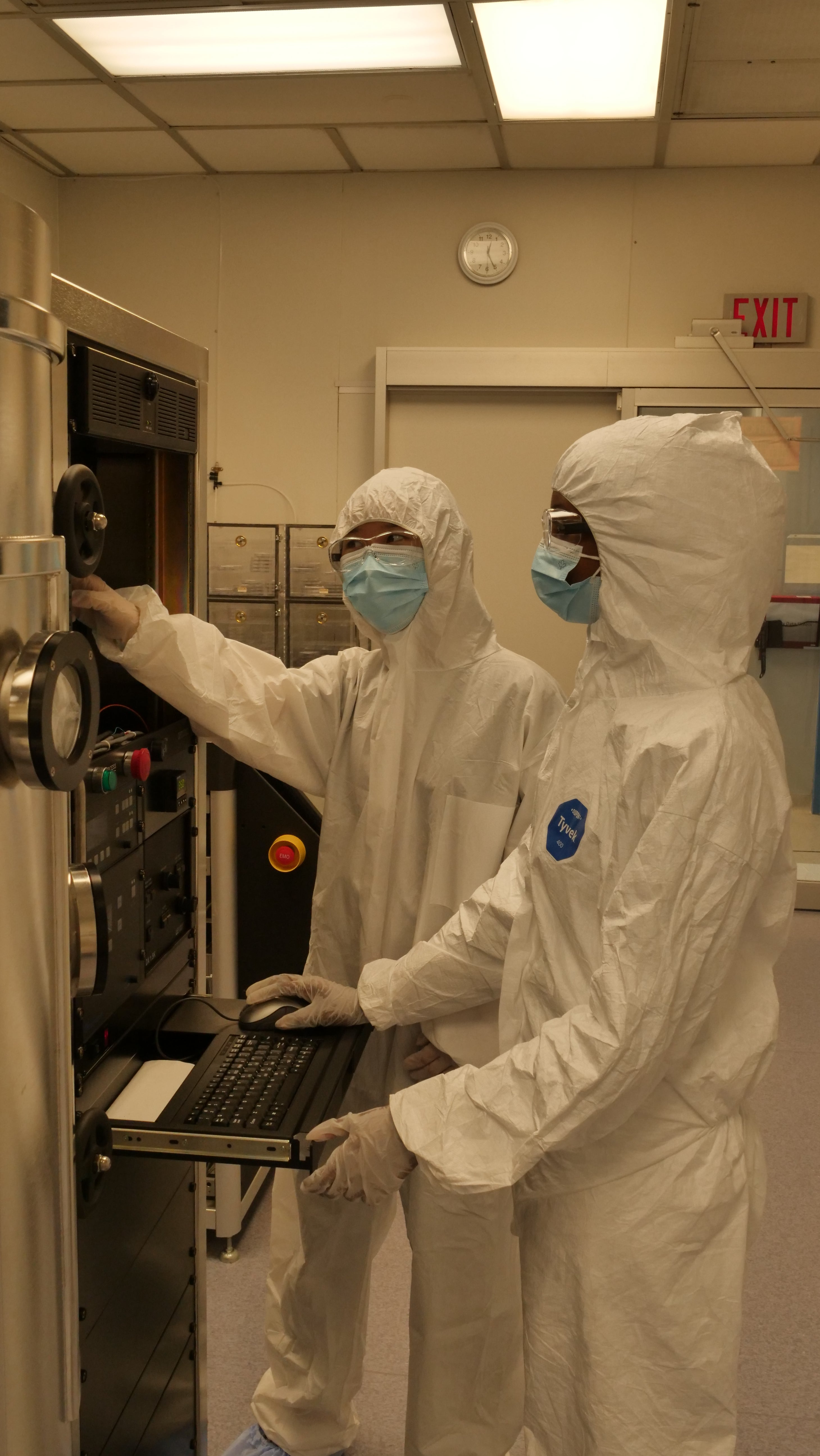 Two technicians working in the cleanroom